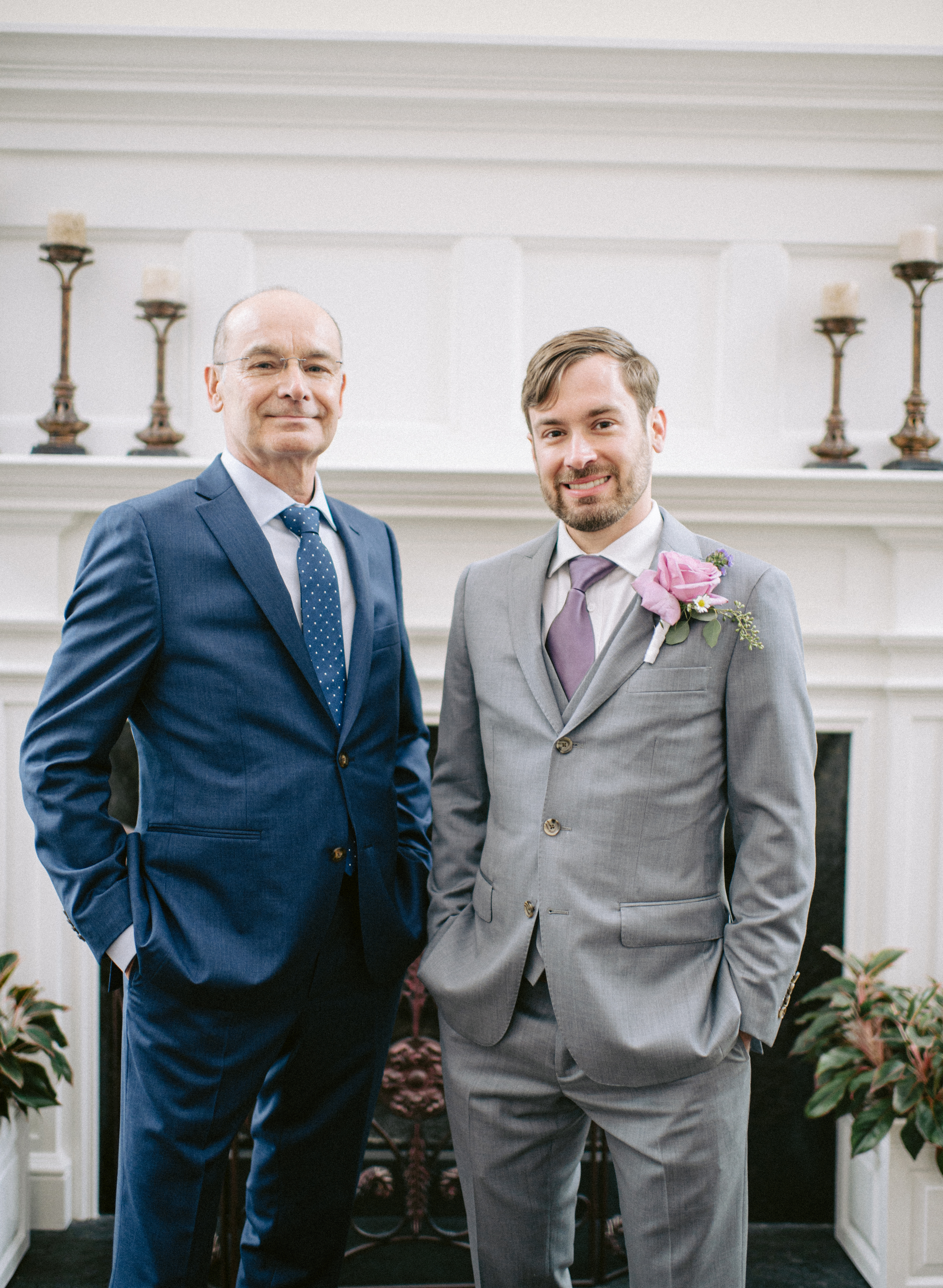 Mieszko Gorski standing with his son at a formal occasion