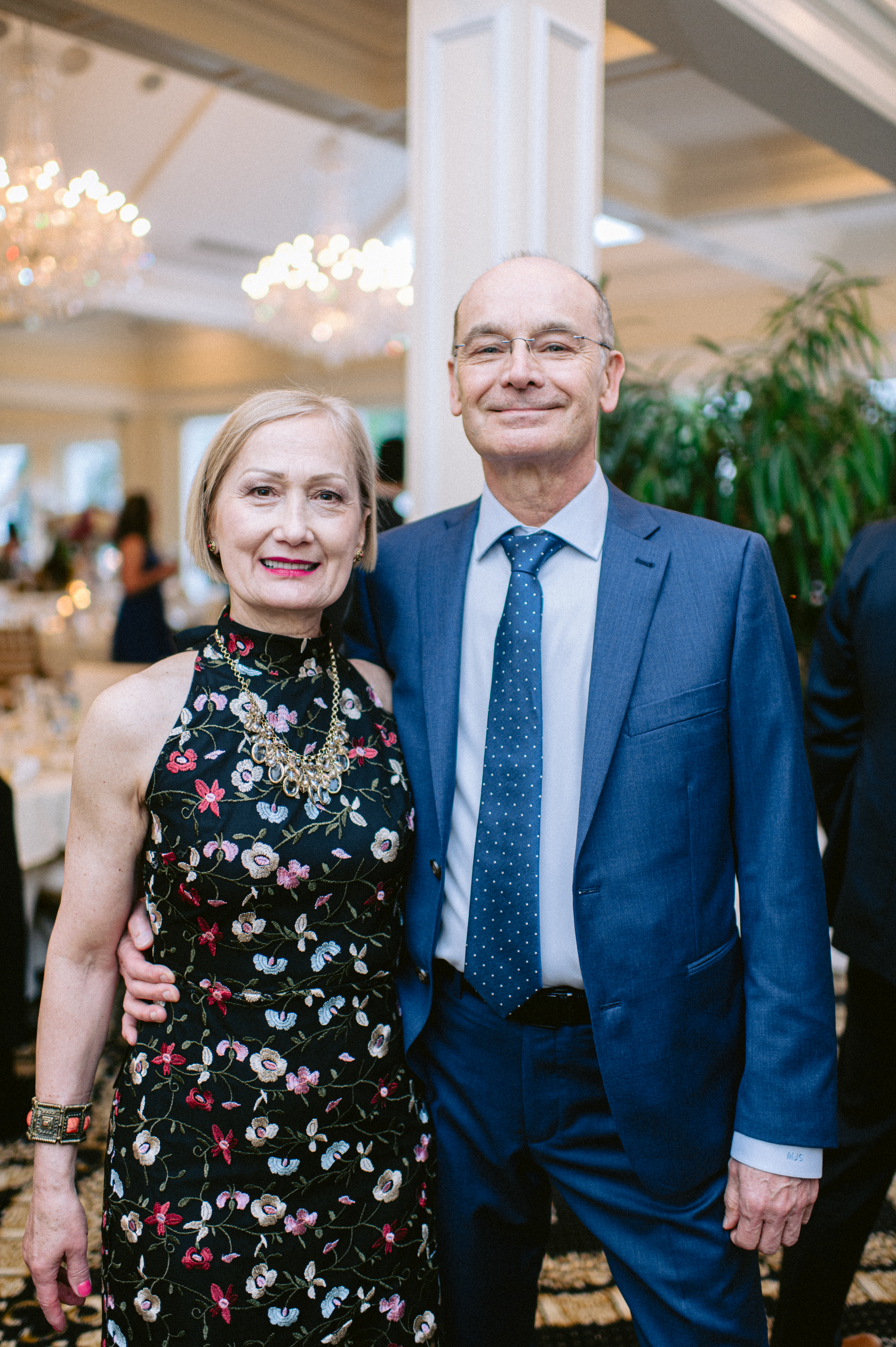 Mieszko Gorski in a blue suit with his wife at a formal family event